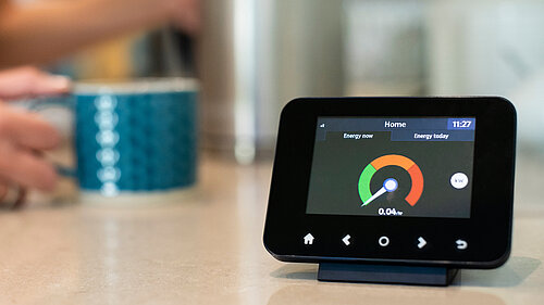 A smart meter on a kitchen worktop