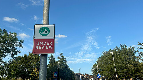 Congestion charge under review sign